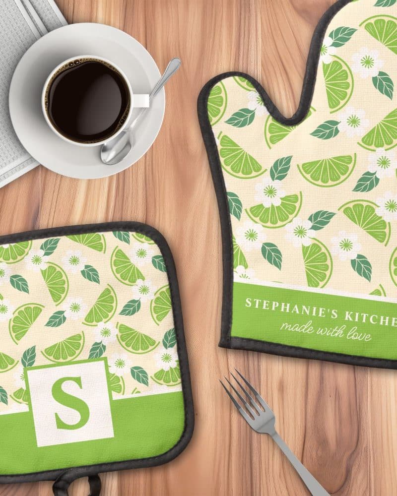 Personalized lime-patterned oven mitts and pot holder.