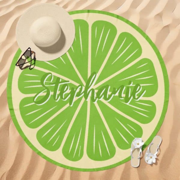 Round Lime-Slice Beach Towel With The Name Stephanie On It.