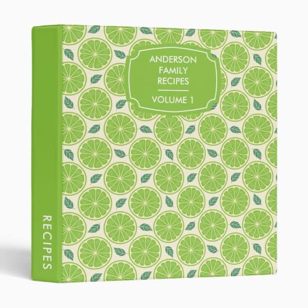Green Binder Labeled Anderson Family Recipes, Volume 1, Featuring A Lime Slice Pattern.