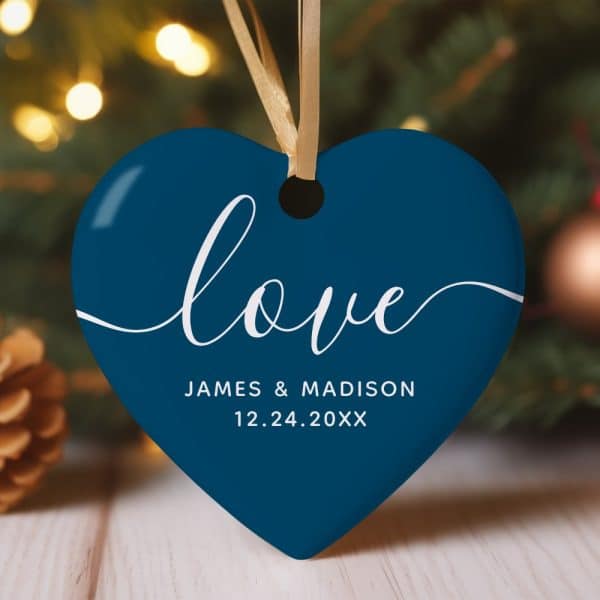 Dark Blue Heart-Shaped Ornament With The Word Love And A Date.