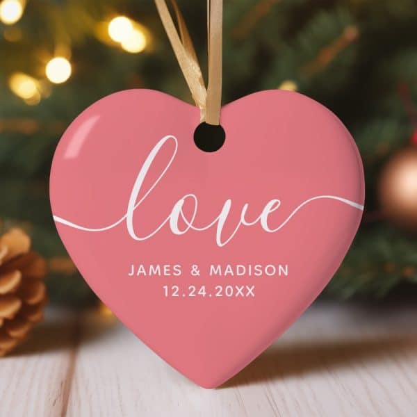 Pink Heart-Shaped Ornament With The Word Love And A Date.
