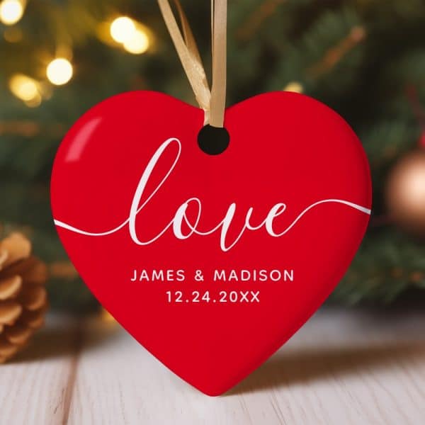 Red Heart-Shaped Ornament With The Word Love And A Wedding Date.