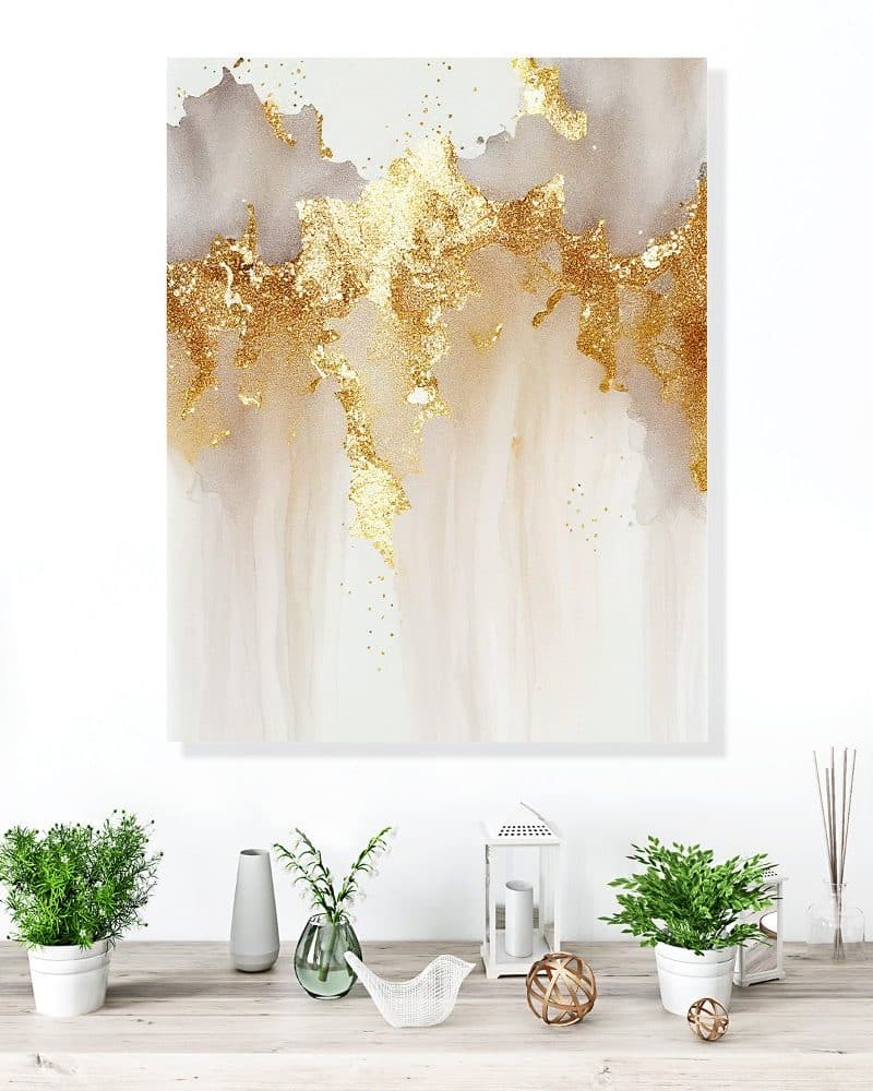 Abstract painting of gold and beige watercolor washes.