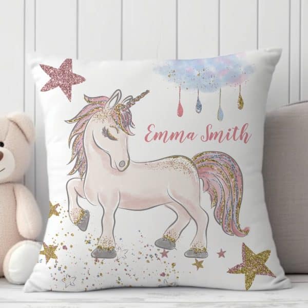 White Pillow With A Sparkly Pink And Gold Unicorn, Stars, And The Name Emma Smith.