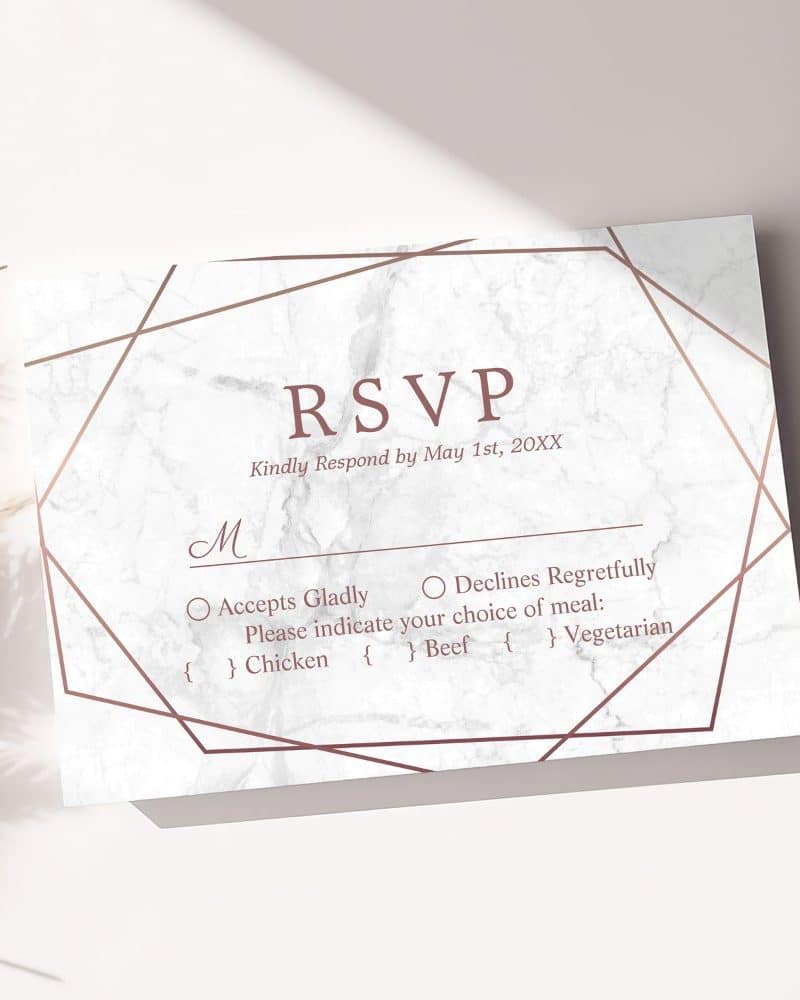 Rose gold geometric design RSVP card with marble background.