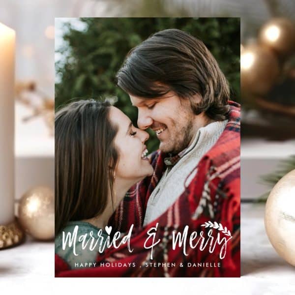 A Newly Married Couple, Stephen And Danielle, Embrace, Faces Close Together Smiling. The Image Is A Holiday Card.