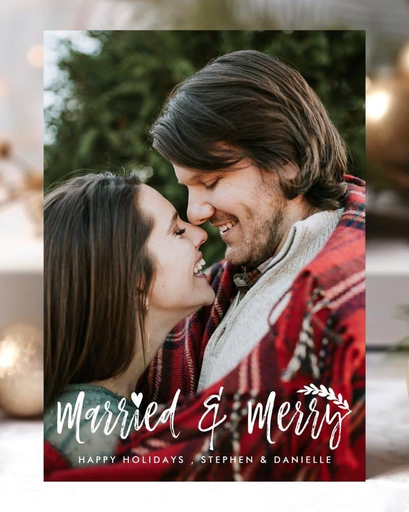 A newly married couple, Stephen and Danielle, embrace, faces close together smiling. The image is a holiday card.