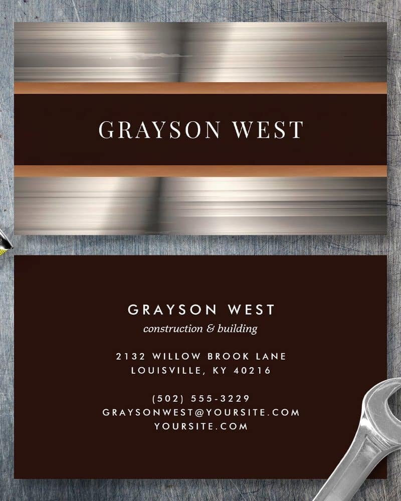 Business card for Grayson West Construction, featuring a brushed metal design.