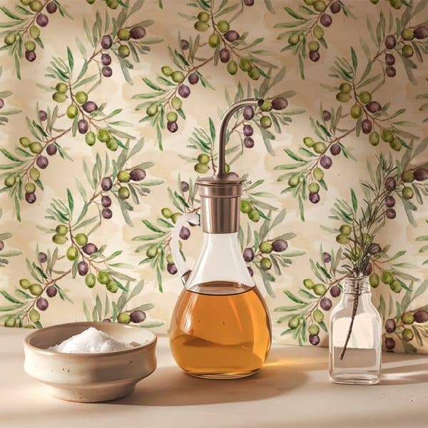 Glass Olive Oil Decanter With Salt Bowl In Front Of Olive Branch Patterned Background.