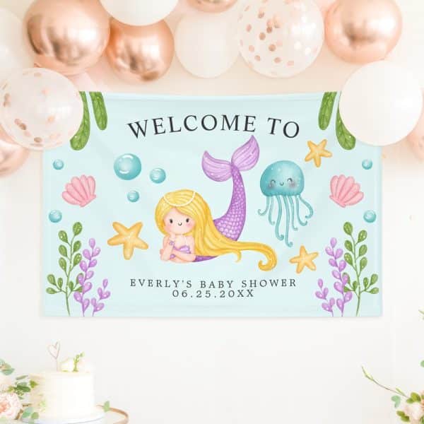 Baby Shower Banner Featuring A Mermaid, Jellyfish, And Seashells On A Light Blue Background. The Banner Says Welcome To Everly'S Baby Shower.
