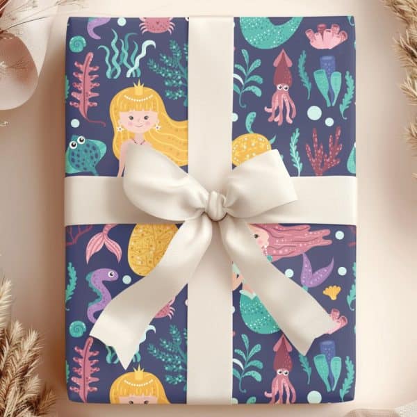 Gift Wrapped In Mermaid-Themed Wrapping Paper With A Cream-Colored Ribbon.