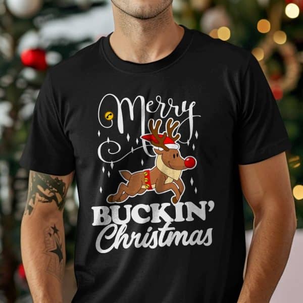Black T-Shirt With A Design Featuring A Reindeer Wearing A Santa Hat And Running, Surrounded By The Text Merry Buckin Christmas.