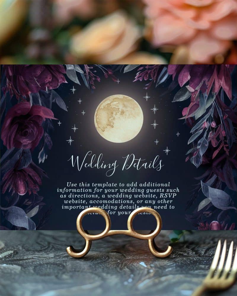 Wedding details card with a dark background, full moon, and dark purple flowers.