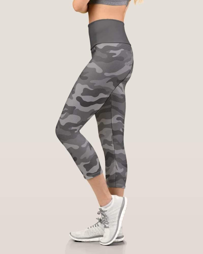 Gray camouflage cropped leggings on a woman's legs.
