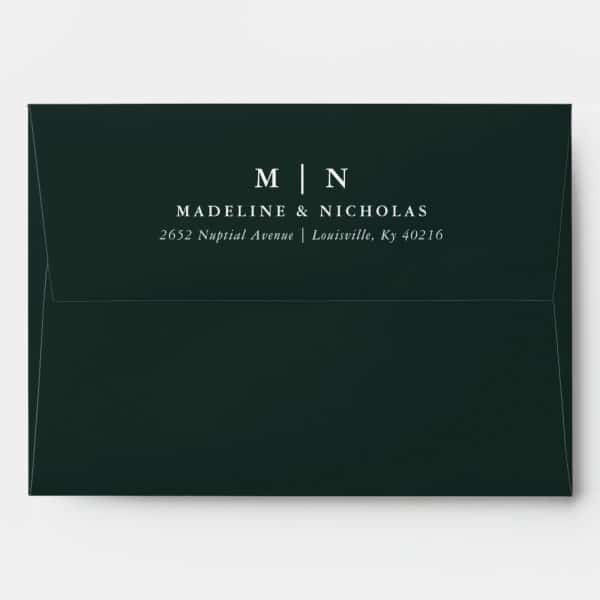 Dark Green Wedding Invitation Envelope With Madeline &Amp; Nicholas'S Names And Address In White Lettering.
