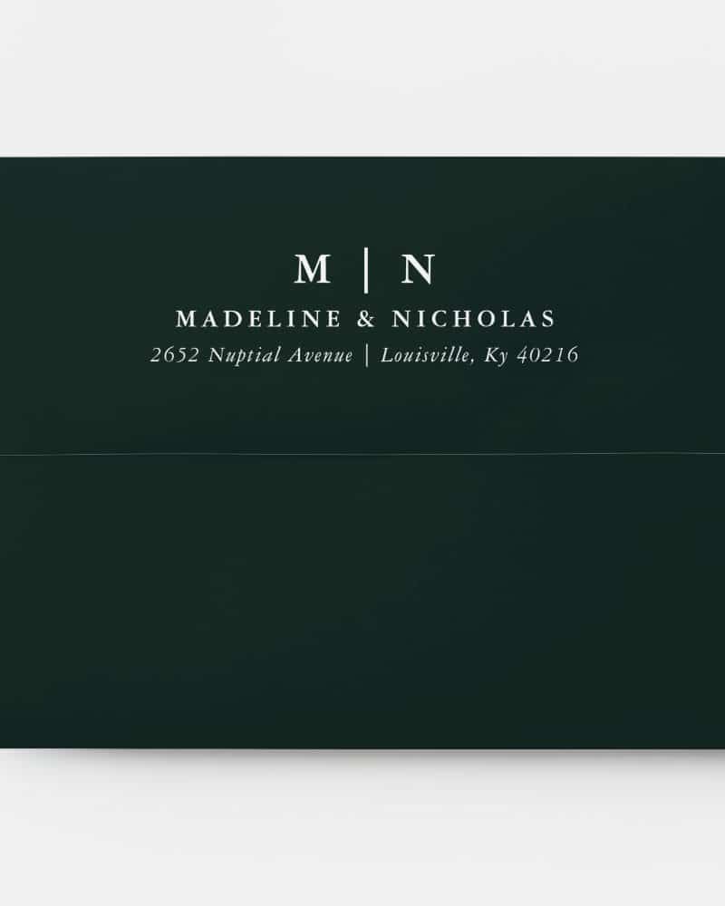 Dark green wedding invitation envelope with Madeline & Nicholas's names and address in white lettering.