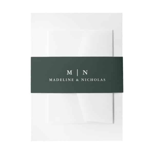 White Stationery With A Dark Green Band, Imprinted With Madeline &Amp; Nicholas'S Initials And Names.