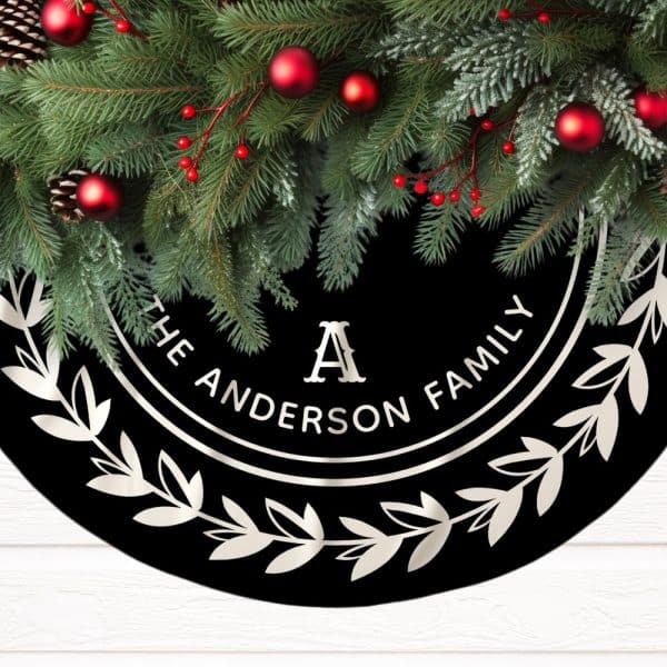 Black Christmas Tree Skirt With Silver Wreath And Personalized Anderson Family Text.