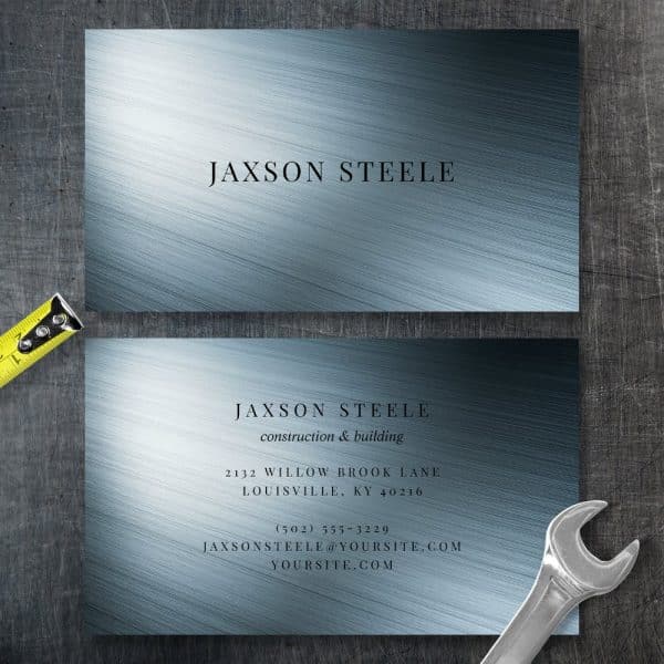 Two Business Cards For Jaxson Steele Construction &Amp; Building, Featuring A Brushed Metal Design.