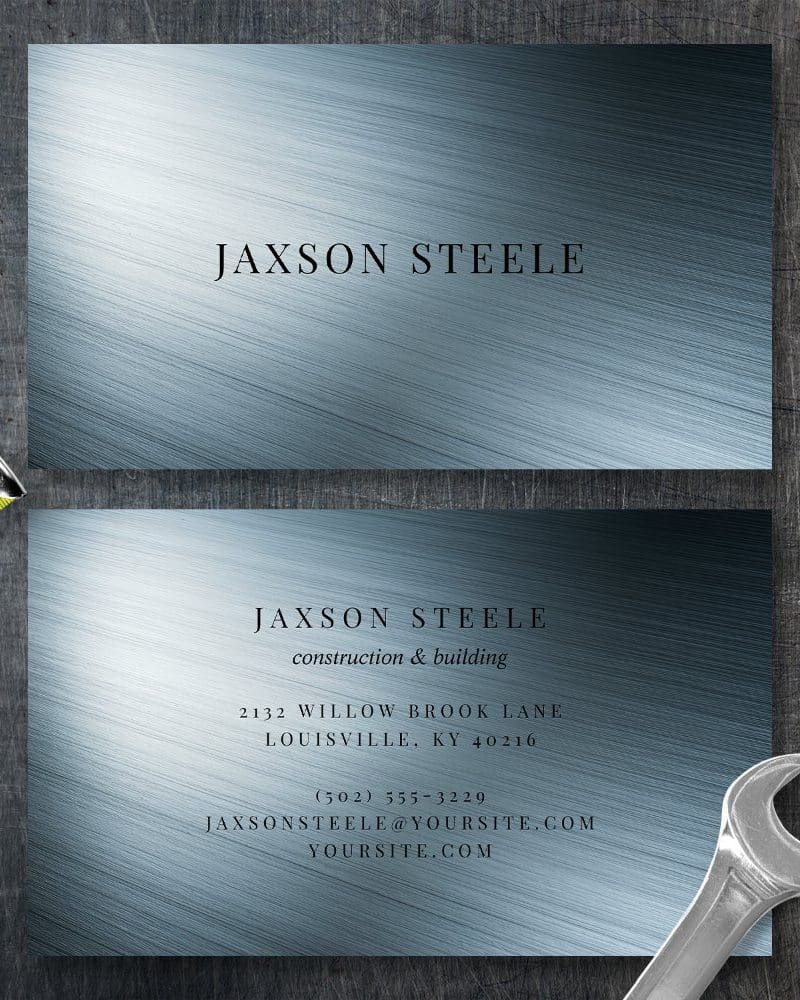 Two business cards for Jaxson Steele Construction & Building, featuring a brushed metal design.