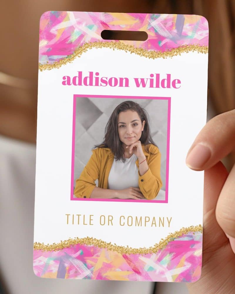 A colorful ID card with a woman's photo, her name Addison Wilde, and space for a title or company.