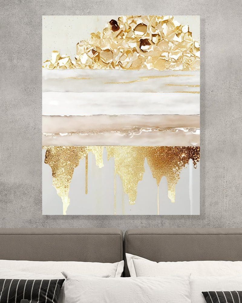 Abstract painting of gold and beige dripping paint on a light gray background.