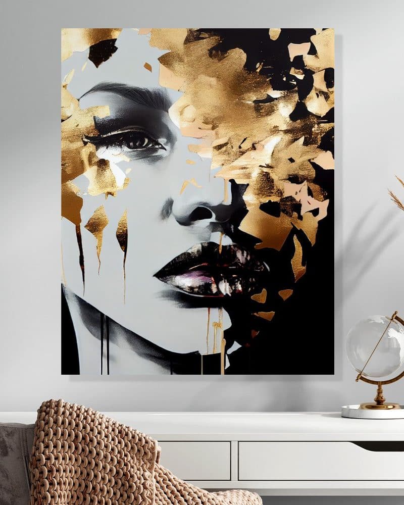 Abstract portrait of a woman's face, partially obscured by gold and black paint splatter.