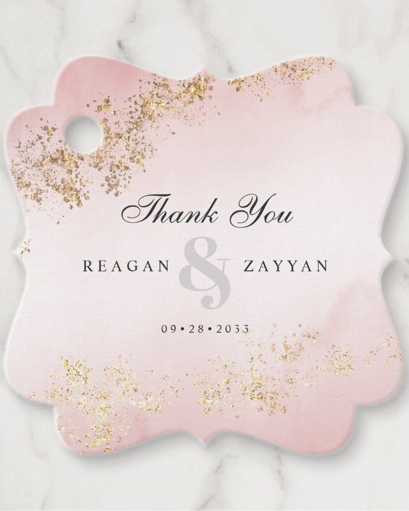 Pink thank you tag with gold glitter, featuring the names Reagan & Zayyan and the date 09 28 2033.