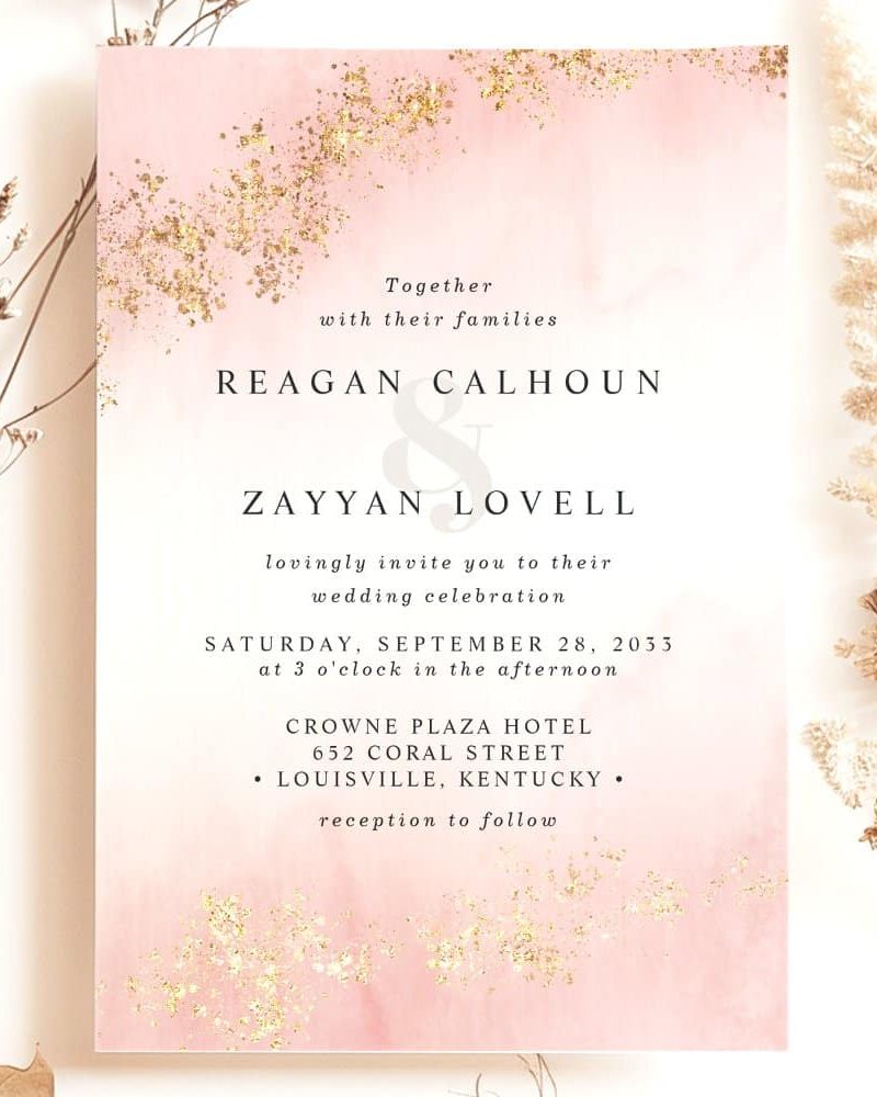 Wedding invitation for Reagan Calhoun and Zayyan Lovell, featuring a blush pink and gold design.