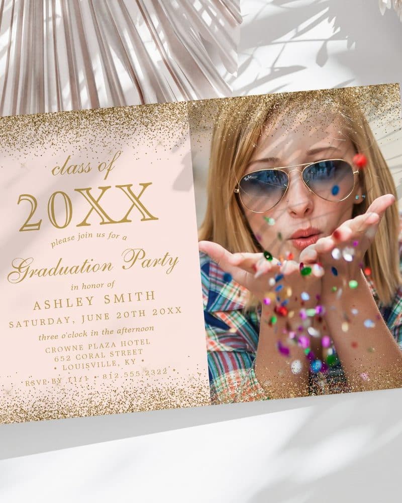 Graduation party invitation with a photo of a young woman blowing confetti.