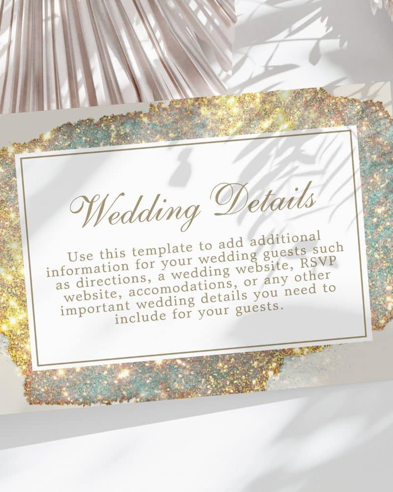 Wedding details card with gold glitter design.