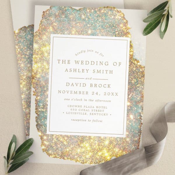 Wedding Invitation For Ashley Smith And David Brock, November 24, At The Crowne Plaza Hotel In Louisville, Kentucky. The Invitation Features A Gold And Teal Sparkly Design.