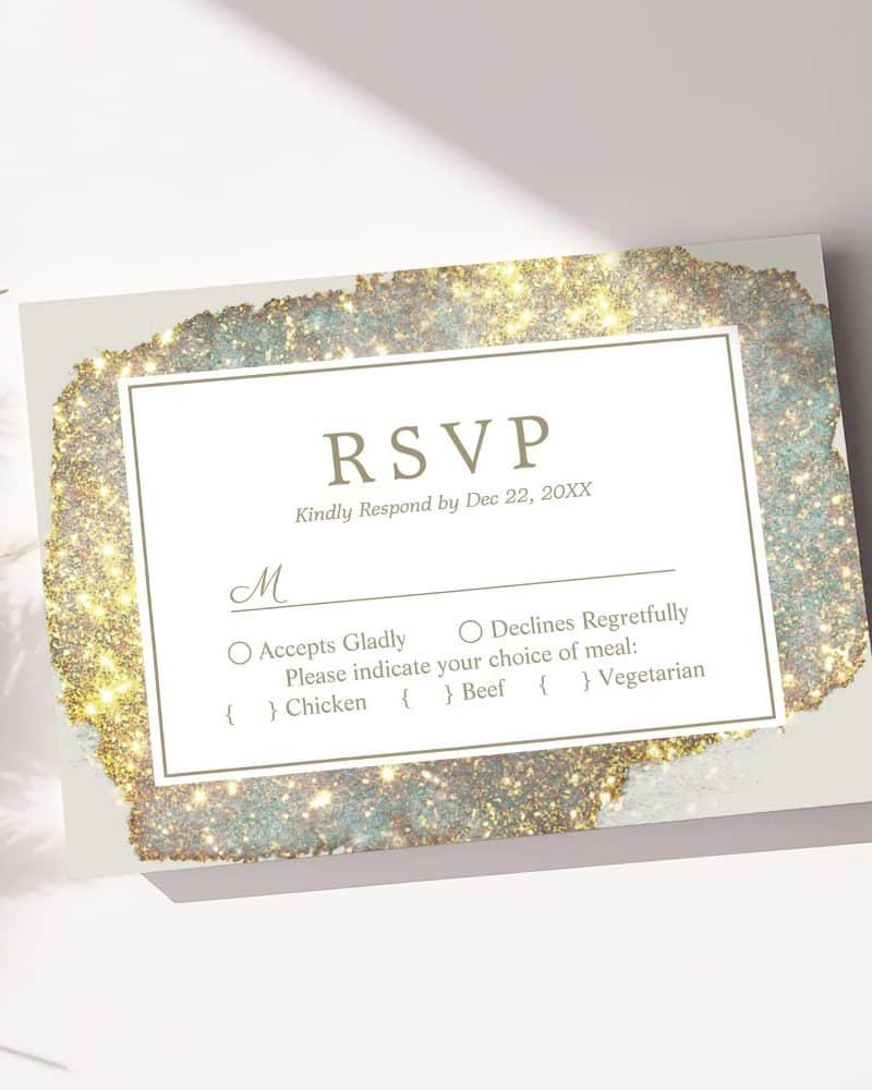 RSVP card with gold and teal glitter design, requesting response by December 22.