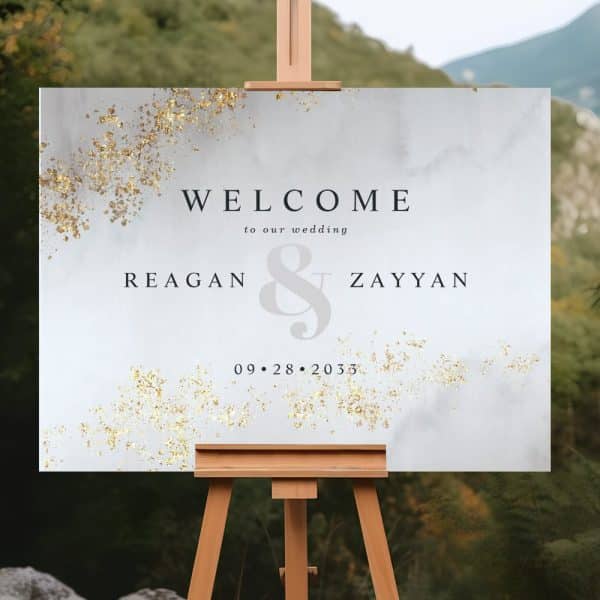 Wedding Welcome Sign For Reagan And Zayyan, September 28, 2033. The Sign Has A Marble Design With Gold Accents.