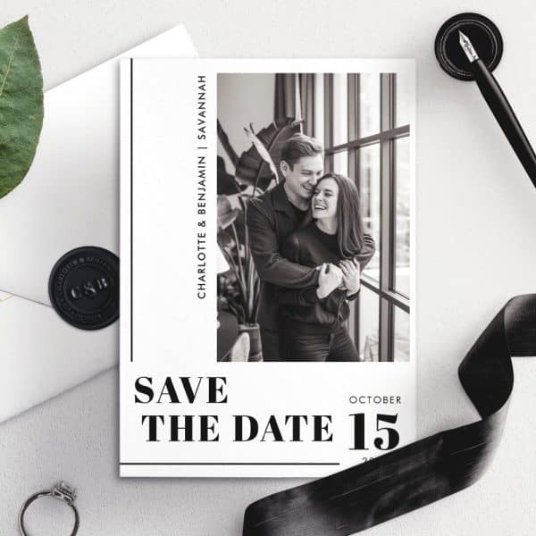 Black And White Save The Date Card Featuring A Photo Of A Happy Couple Embracing. The Text Reads Save The Date October 15.