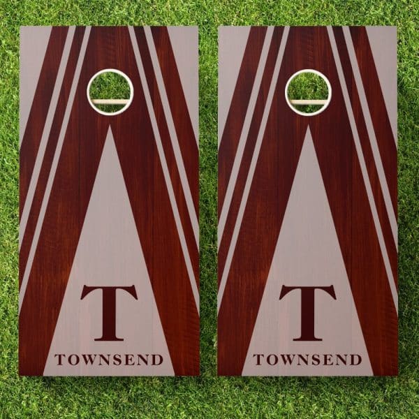 Pair Of Personalized Brown And Beige Cornhole Boards With The Initial T And The Last Name Townsend.