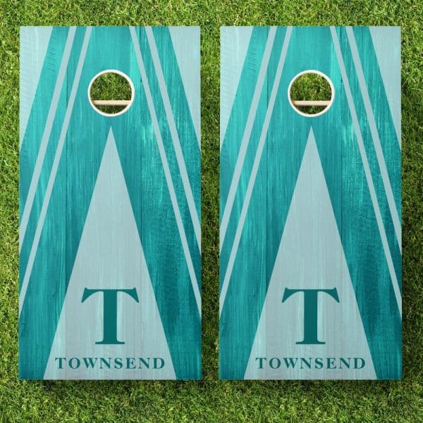 Pair Of Teal And Gray Wooden Cornhole Boards With The Initial T And The Name Townsend.