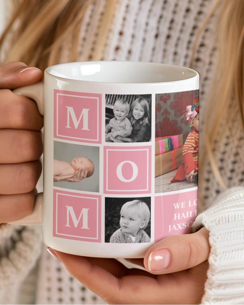 A white coffee mug displaying a photo collage of children and the word MOM in pink squares.