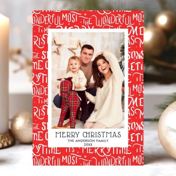 Christmas Card Featuring A Family Portrait Of Parents And A Toddler On A Rocking Horse.