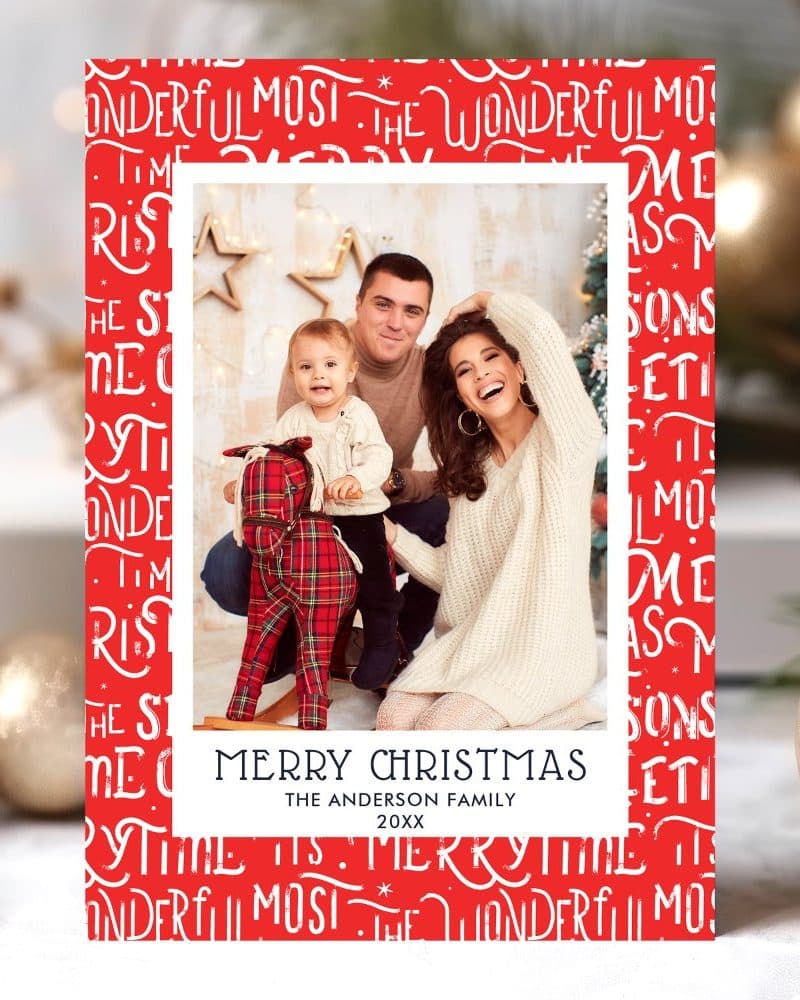 Christmas card featuring a family portrait of parents and a toddler on a rocking horse.