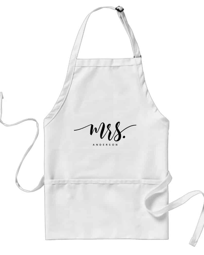 White apron with a black script Mrs. Anderson.