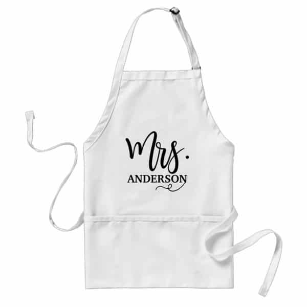 White Apron With Black Text Reading Mrs. Anderson.
