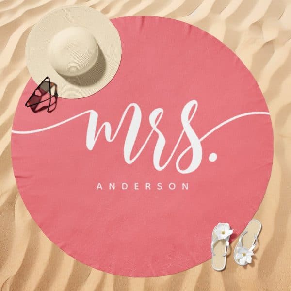 Pink Round Beach Towel With Mrs. Anderson In White Script.