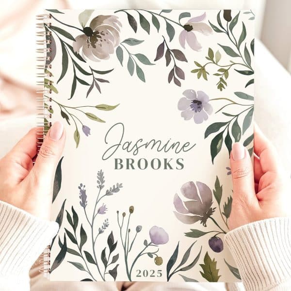 A Spiral-Bound 2025 Planner With A Floral Design And The Name Jasmine Brooks.