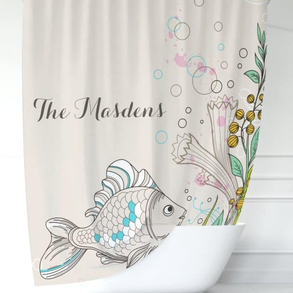 Beige Shower Curtain With The Name The Madsens And A Stylized Illustration Of A Fish Swimming Near Aquatic Plants.