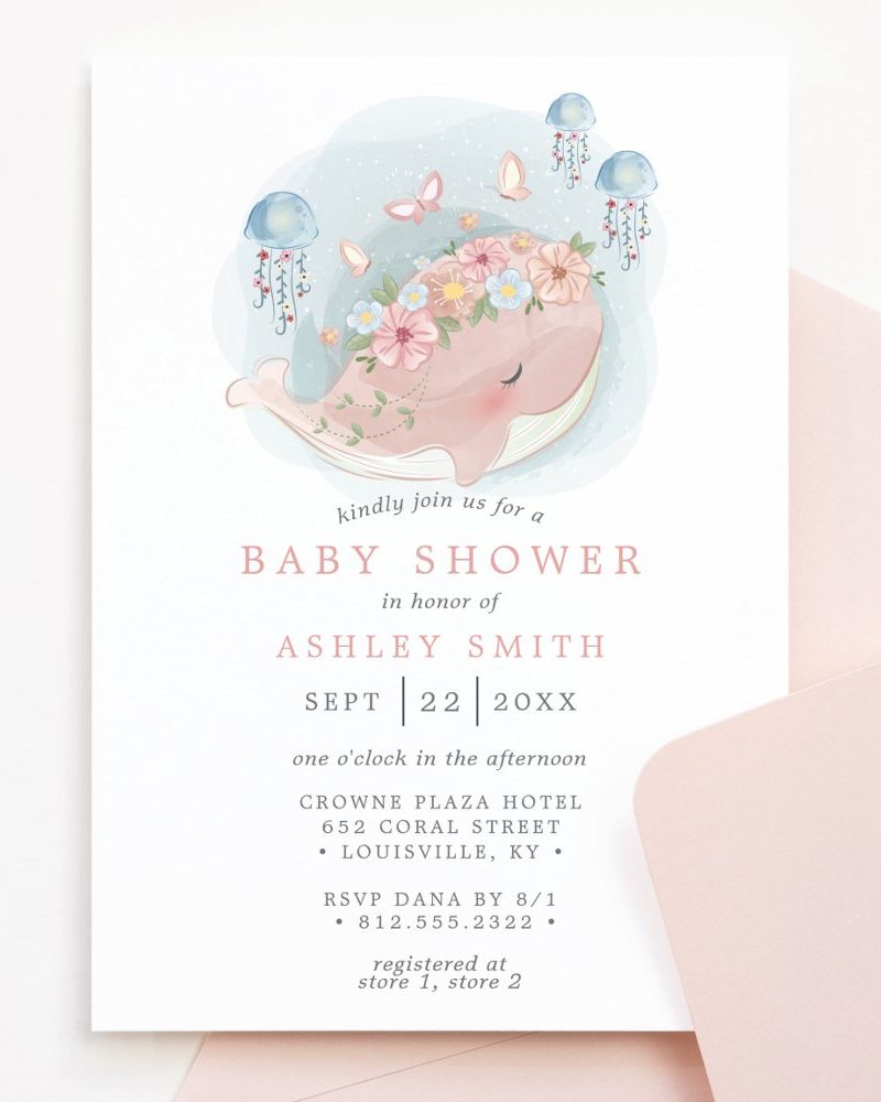 Baby shower invitation featuring a watercolor illustration of a whale wearing a flower crown, surrounded by jellyfish and butterflies.