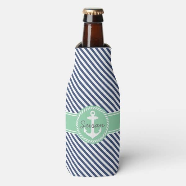 Beer Bottle Coolie With Navy Blue And White Stripes, A Mint Green Band Featuring A Nautical Anchor And The Name Susan.