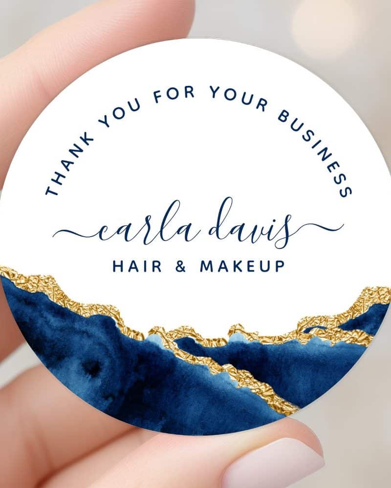 Round thank you sticker featuring navy blue and gold design, with Carla Davis Hair & Makeup.