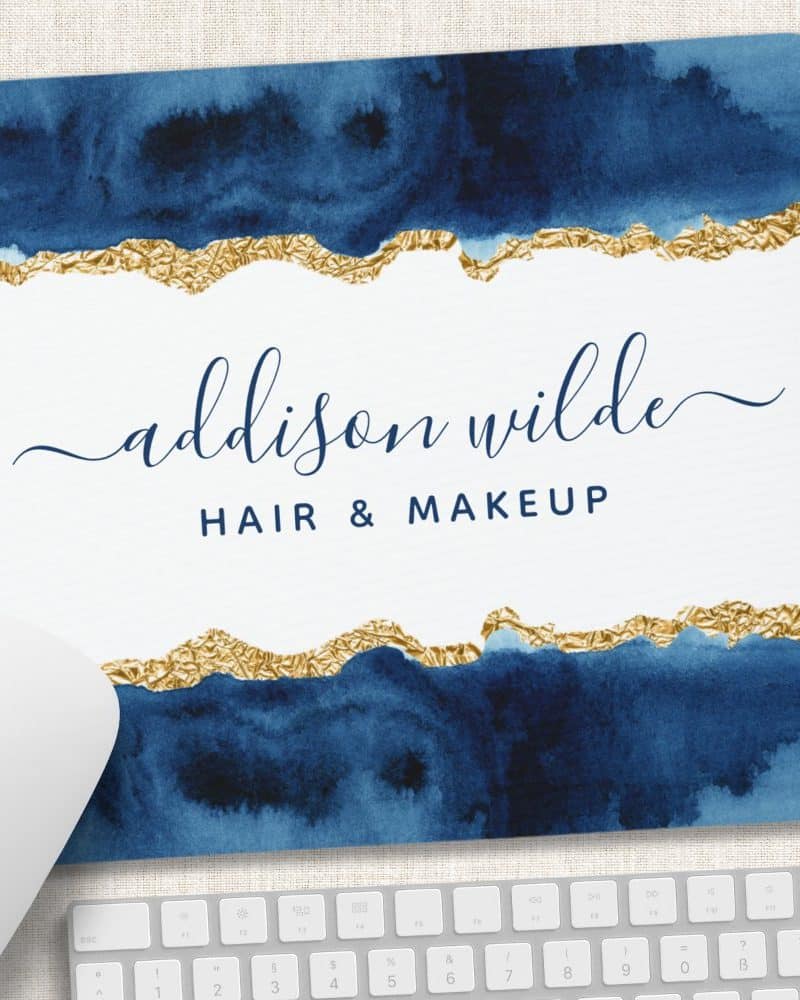 Mousepad with navy blue watercolor design, gold accents, and the name Addison Wilde Hair & Makeup.