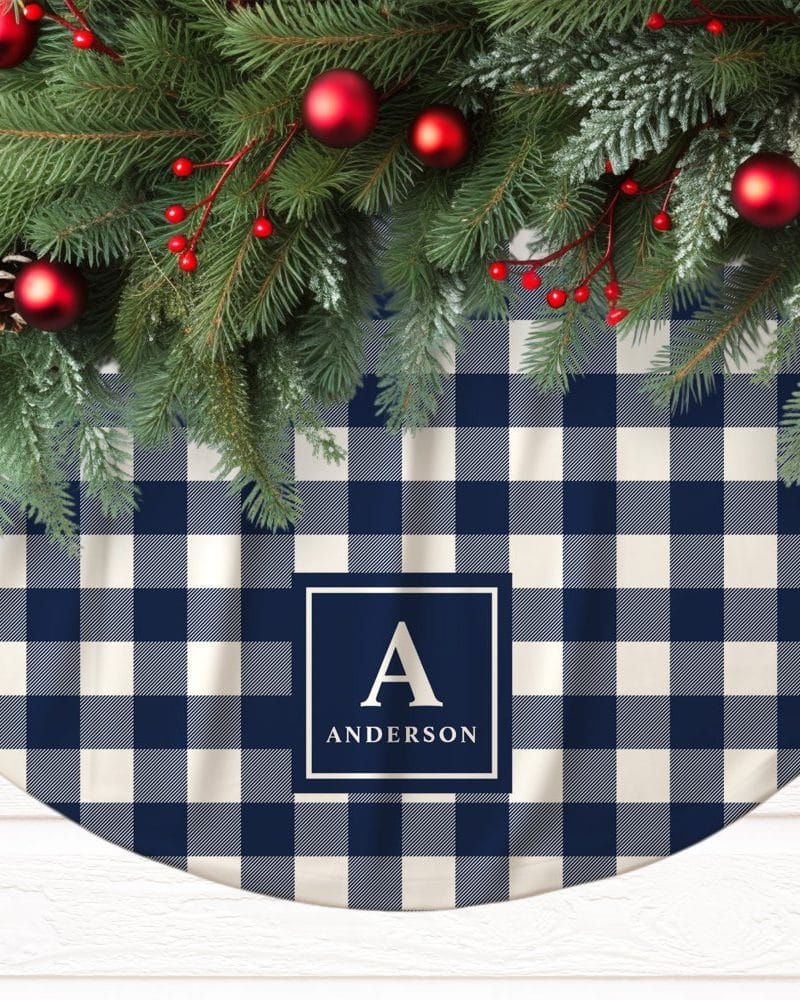 Navy blue and cream gingham Christmas tree skirt with the initial A and the name Anderson.